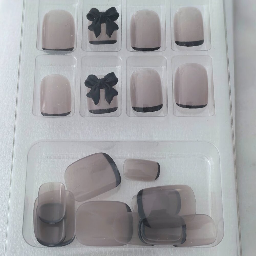 Elegant Press-On Nails – Nude with French Tips & Bow Design